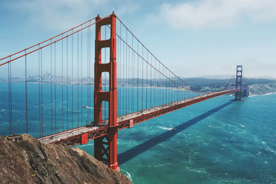 The Golden Gate Bridge in San Francisco with fog rolling over the Marin Headlands